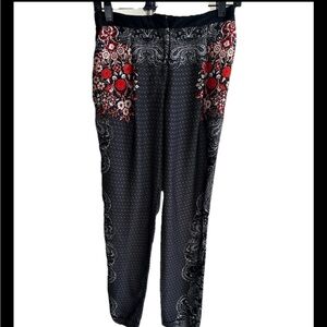 River Island Patterned black pants size 8 for holidays! High end European brand